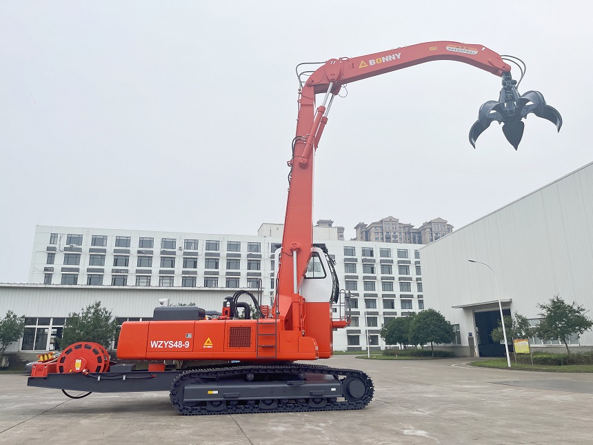 雙動(dòng)力抓鋼機(jī).jpg 雙動(dòng)力抓鋼機(jī).jpg